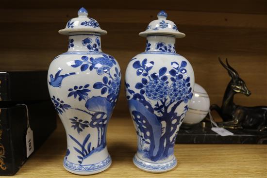 A pair of Chinese blue and white vases and covers, kangxi period Height 26cm